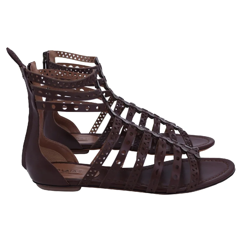 Alaia Bordeaux Gladiator Flat Sandals in Brown Leather