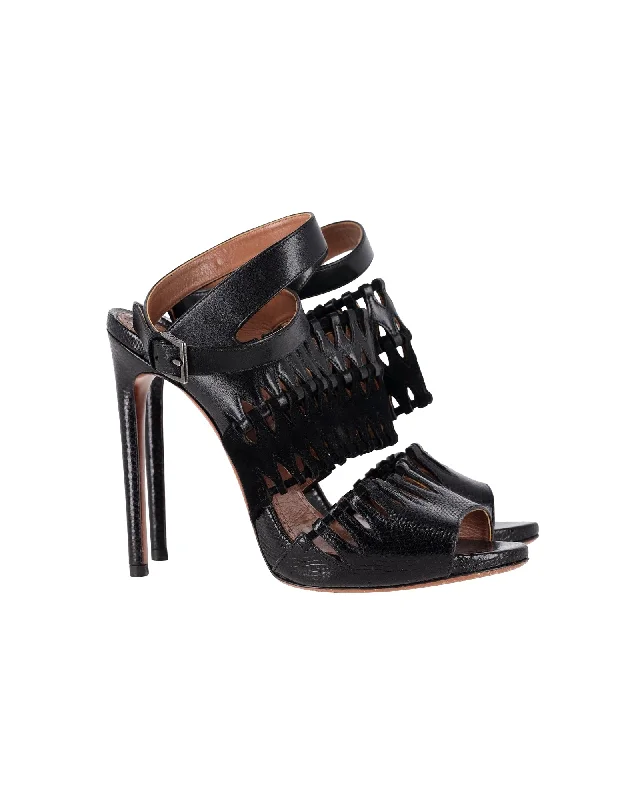 AlaÏa Cut Out Ankle-Strap Sandals in Black Leather